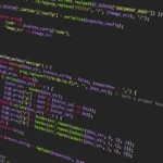 Colorful PHP code displayed on a dark screen, ideal for programming themes.