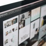 Ferramentas para criar site em uso em um monitor com layout web criativo no escritório
